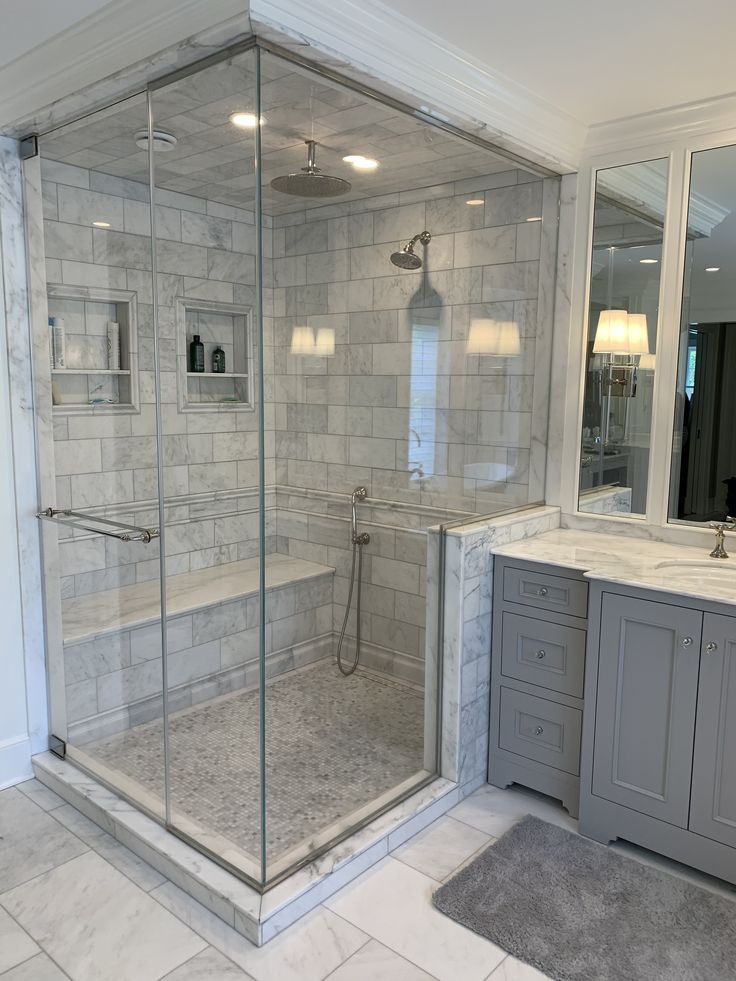 Full custom shower with frameless glass and premium tile work