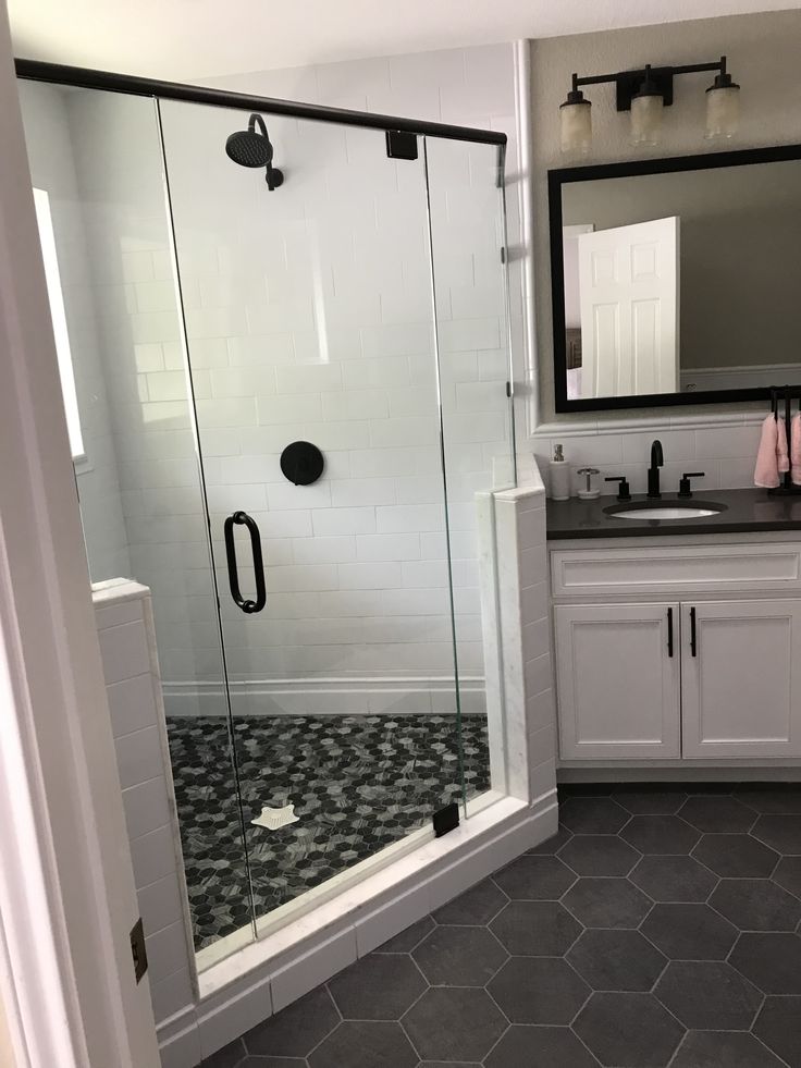Luxurious custom bathroom with walk-in shower by Construction Specialties of Illinois